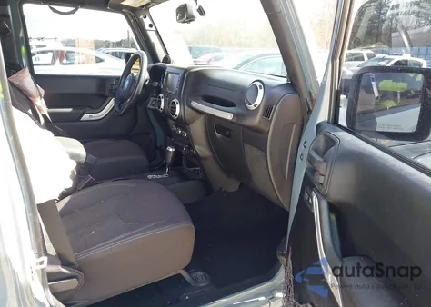 2014 Jeep Wrangler Unlimited Sahara из США, поврежденный, VIN 1C4HJWEG7EL104869